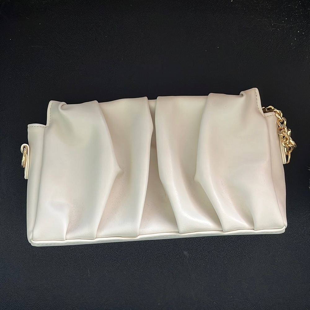 Cream clutch with straps